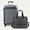 Gray suitcase and duffel bag with handle on a white background