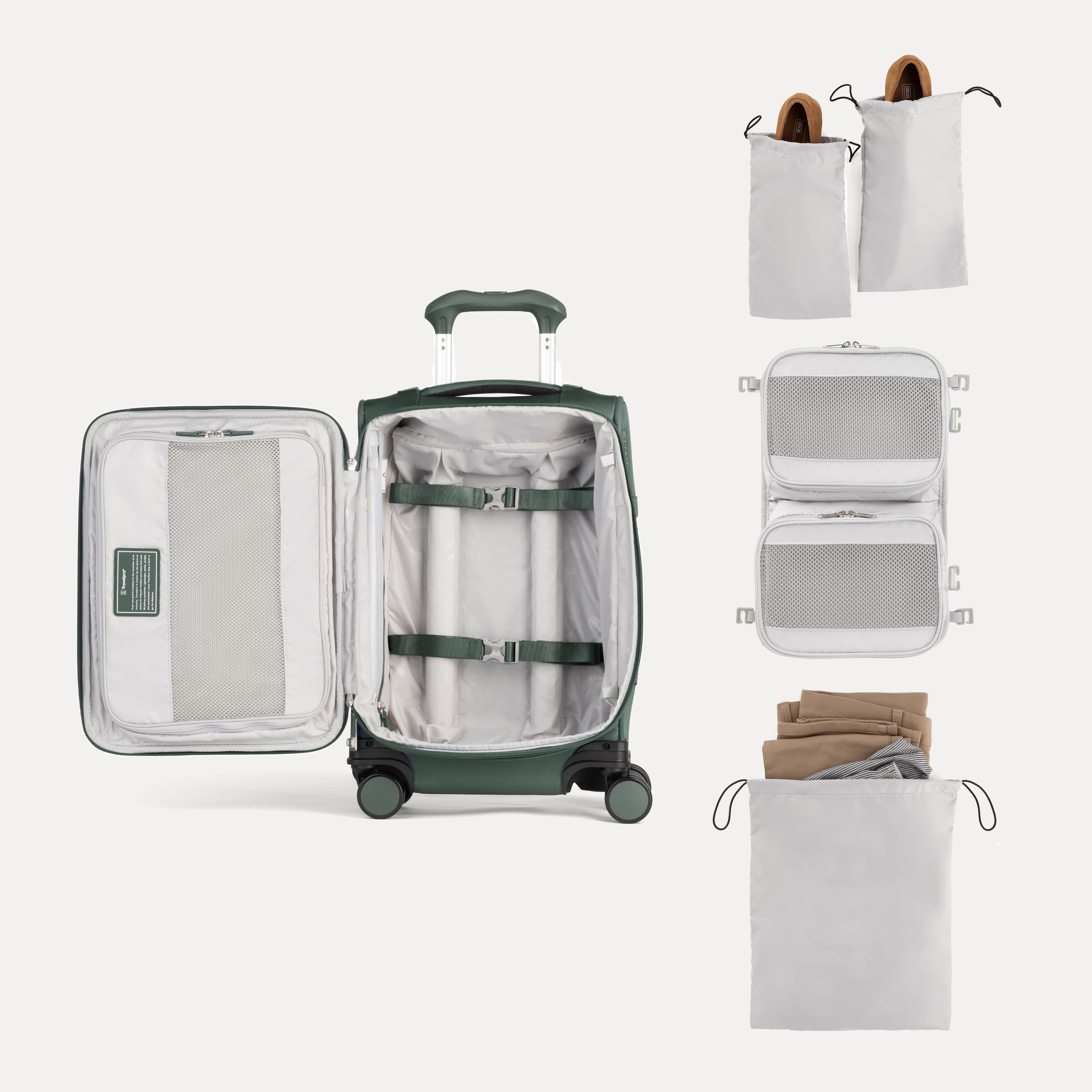 Open suitcase with travel accessories on a white background