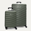A set of two green Maxlite Air V2 hardside spinner suitcases, one carry-on size and one large check-in size, with a textured surface, integrated handles, and wheels.