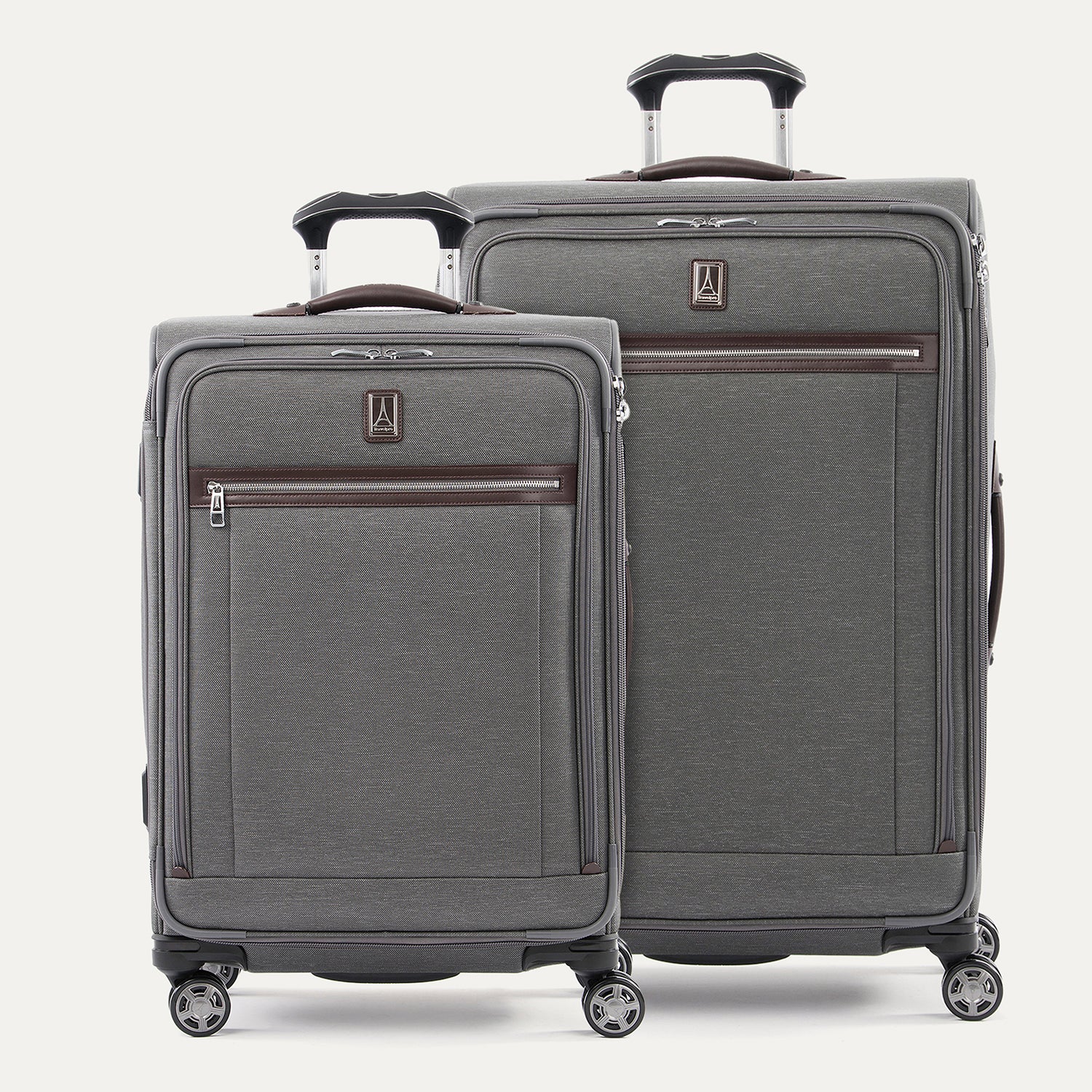 A set of two gray suitcases with spinner wheels and a power scope handle, branded with Travelpross logo.