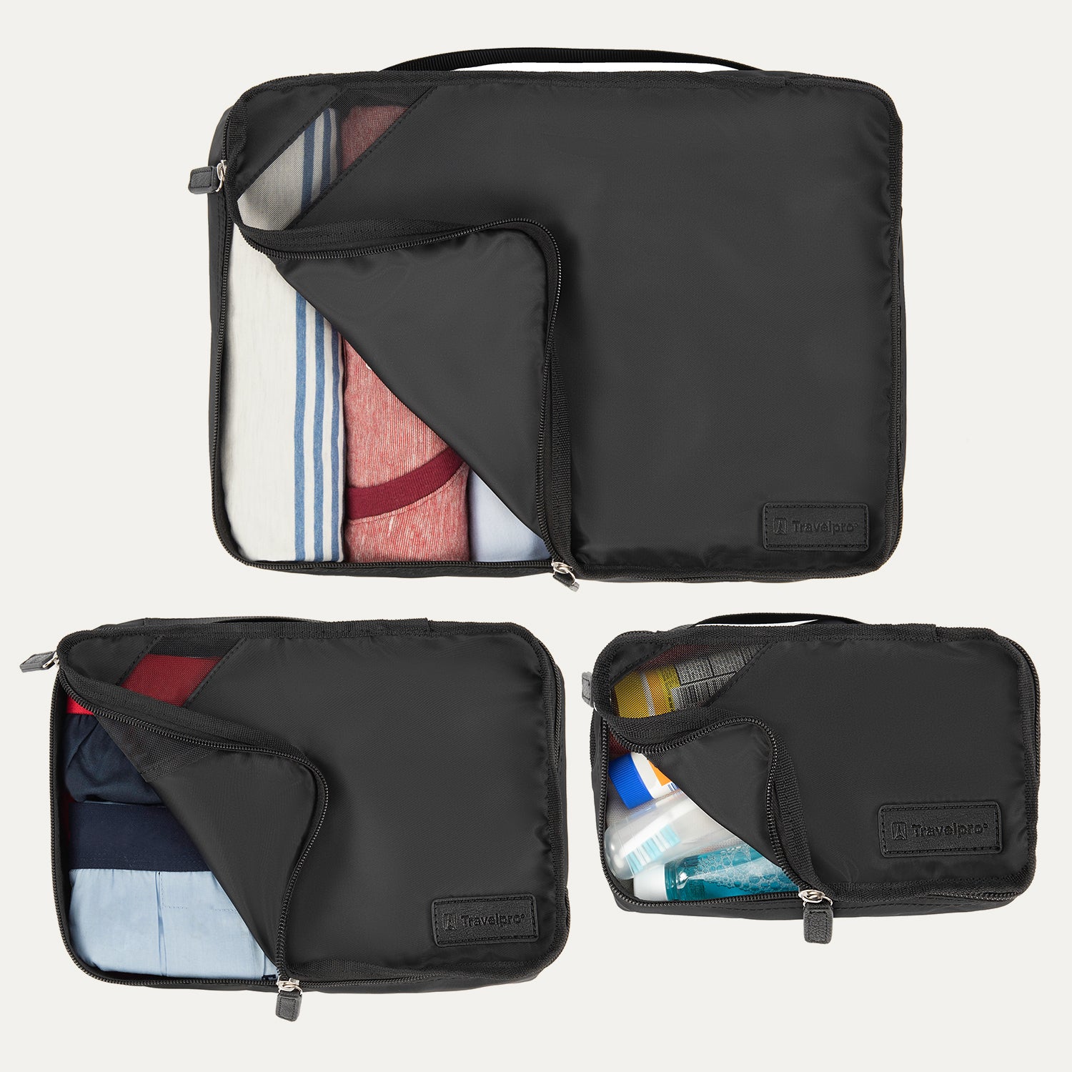 Top view of Travelpross Essentials 3 Pack Packing Cube Set (S/M/L) in BLACK, partially open to show packed clothing and toiletries.

