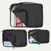 Top view of Travelpross Essentials 3 Pack Packing Cube Set (S/M/L) in BLACK, partially open to show packed clothing and toiletries.
