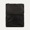 A black Travelpross Essentials washable travel laundry bag with a mesh pocket on the front