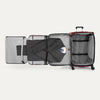 Interior view of the Crew™ Classic Large Check-In Spinner in Rosewood Red, shown with suiter system fully extended and clothing neatly packed.
