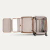 Open suitcase with open suiter compartment on a white background