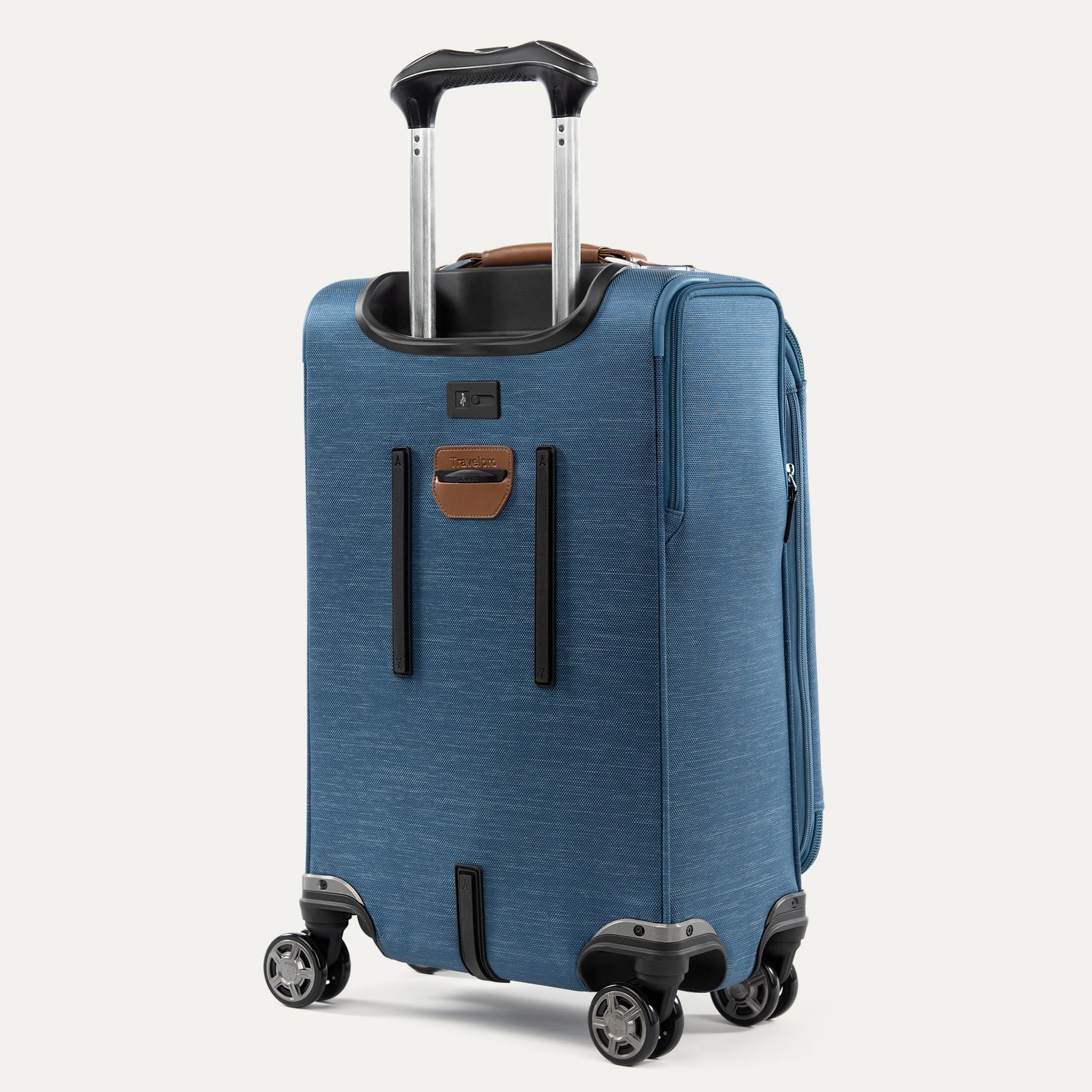 Blue suitcase with black handle and wheels on a white background