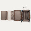 Open suitcase with open suiter compartment on a white background