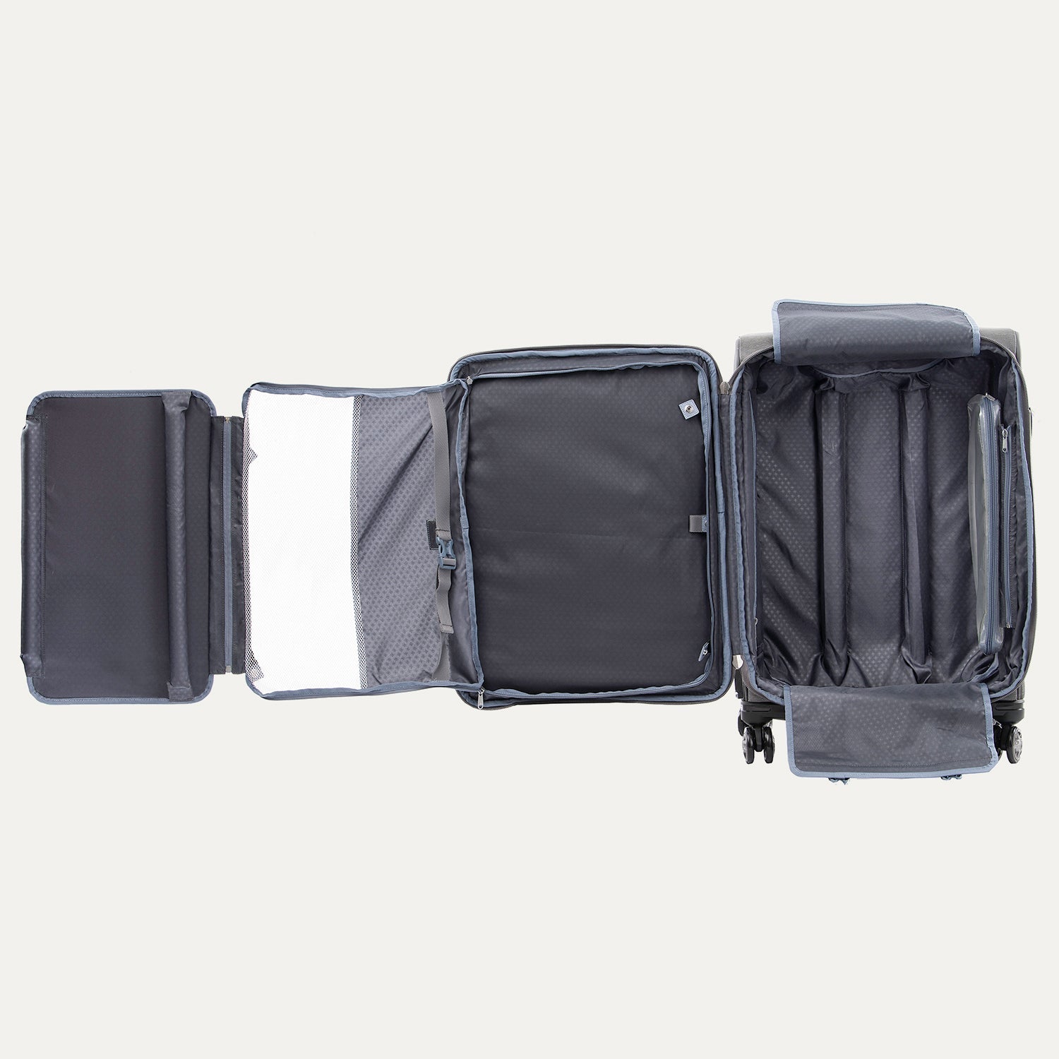 Open suitcase with open suiter compartment on a white background