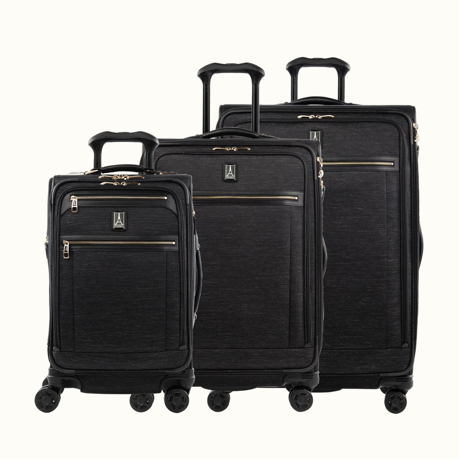 Set of three black suitcases on a white background