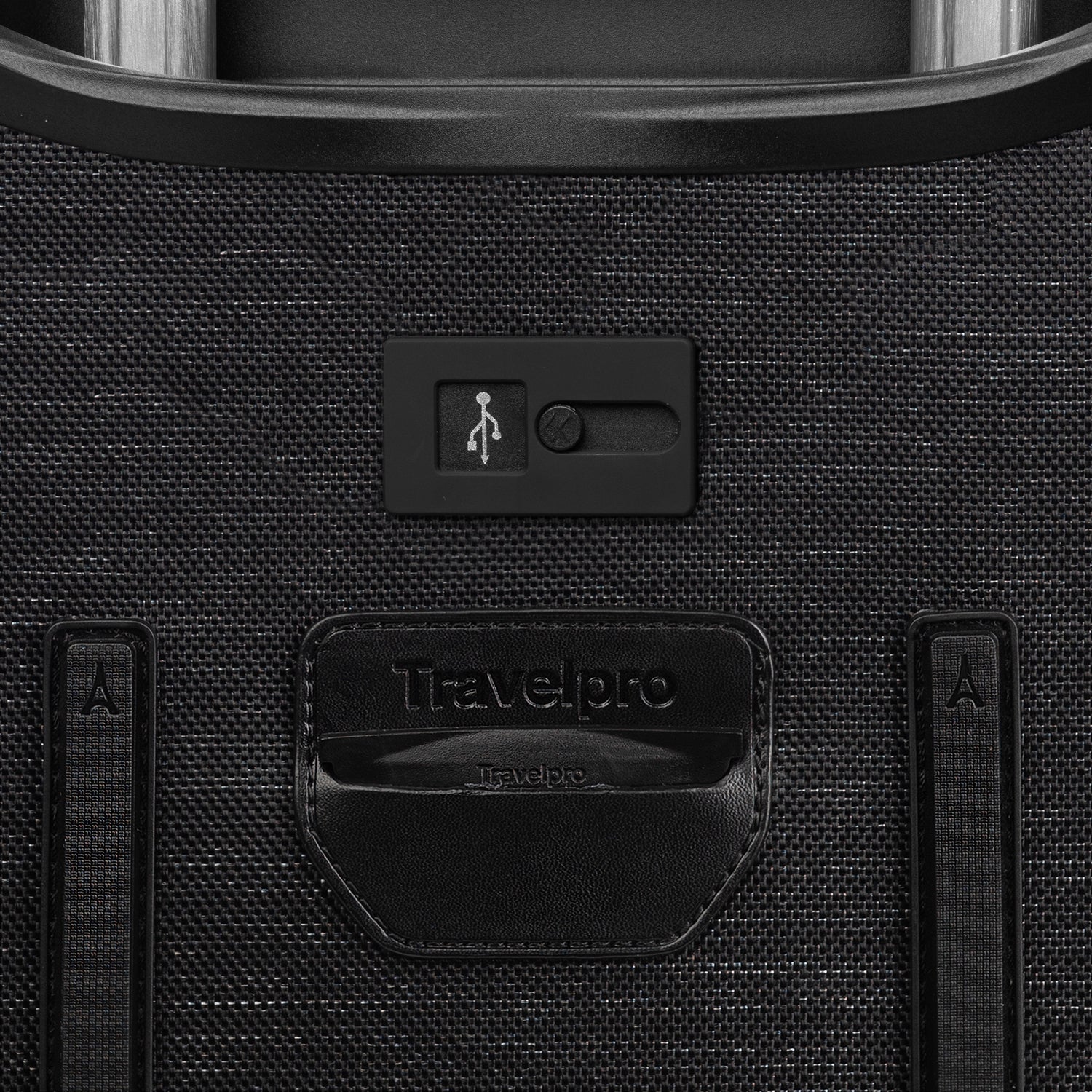 Close-up of a black suitcase with USB port and Travelpross branding.