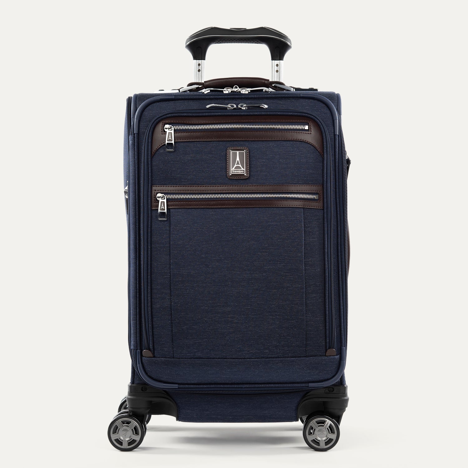 Front view of Travelpross Platinum Elite International Carry-On Spinner in True Navy, with leather-accented zippered pockets and PowerScope Extension Handle.
