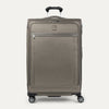 Front-facing Travelpross Platinum Elite Large Expandable Spinner in Metallic Sand, with silver zipper accents and 360° spinner wheels.
