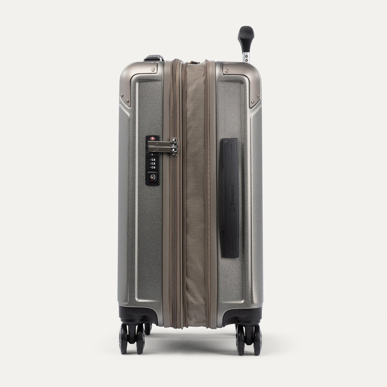 Side view of expanded metallic sand  suitcase with combination lock on a white background