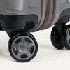 Close-up of suitcase wheels on a white background