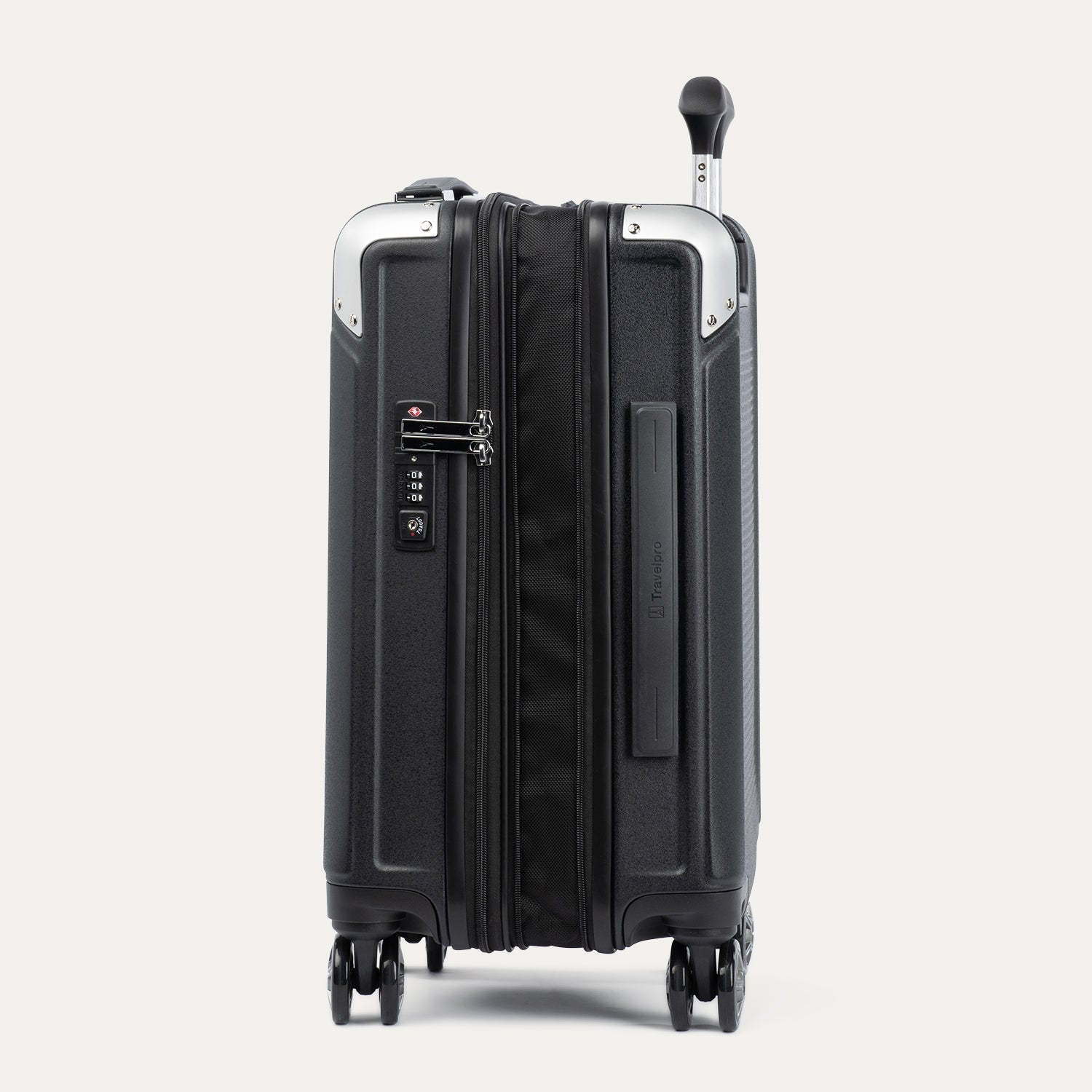 Side view of black suitcase with handle and wheels on a white background