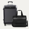 Black suitcase and duffel bag on a white background