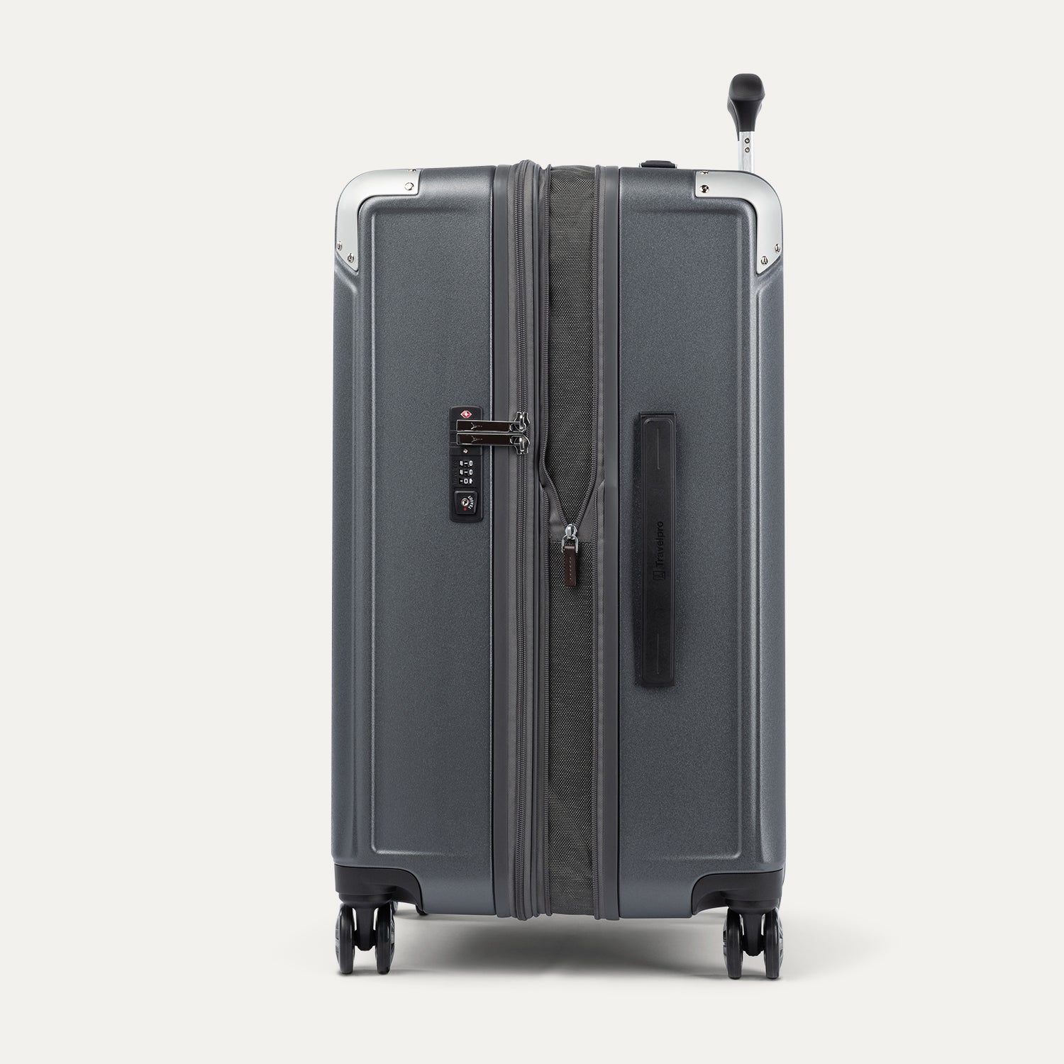 Side view of grey suitcase expanded and with a tsa lock on a white background