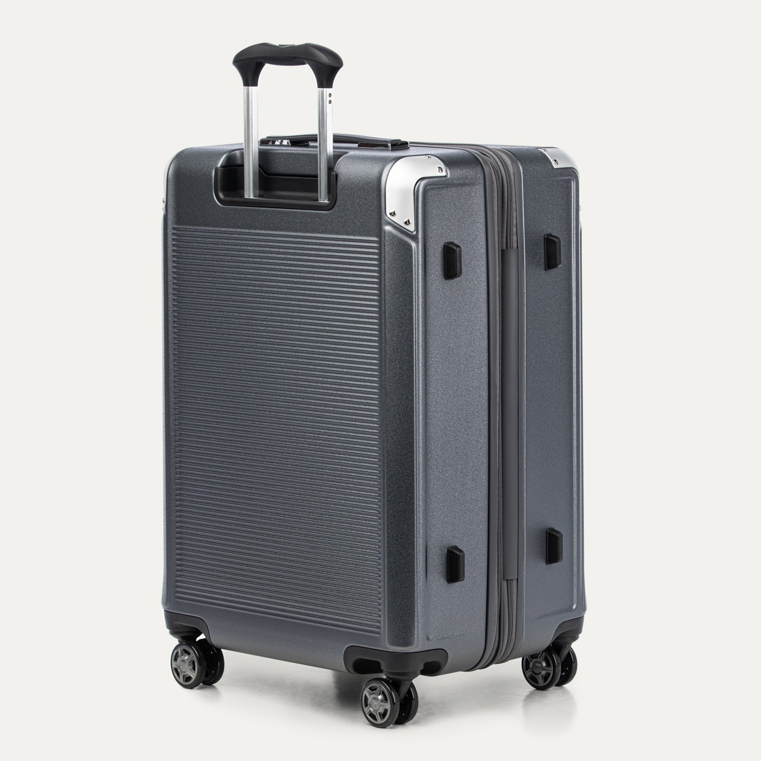 True navy suitcase with a textured surface on a white background