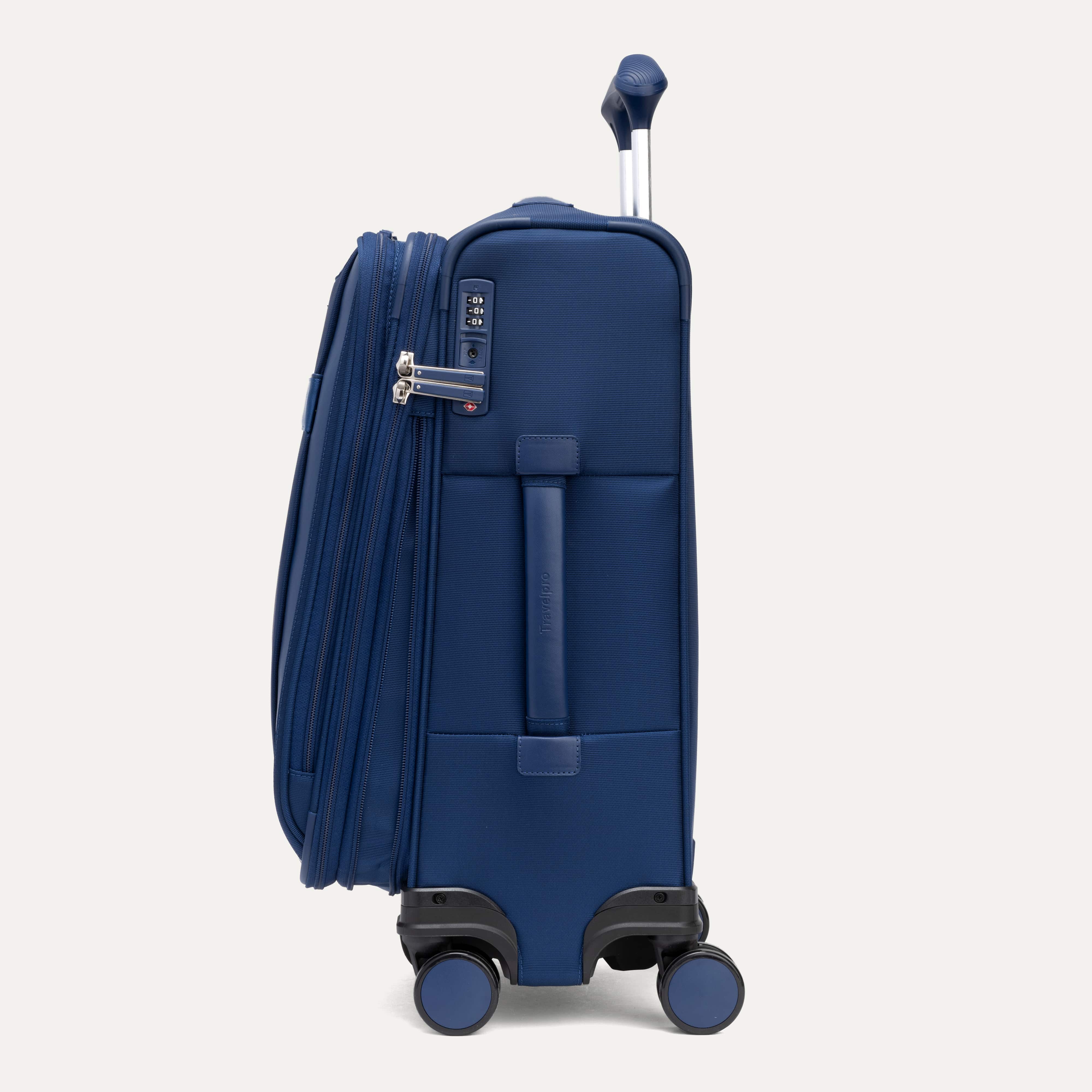 Blue suitcase with black wheels on a white background