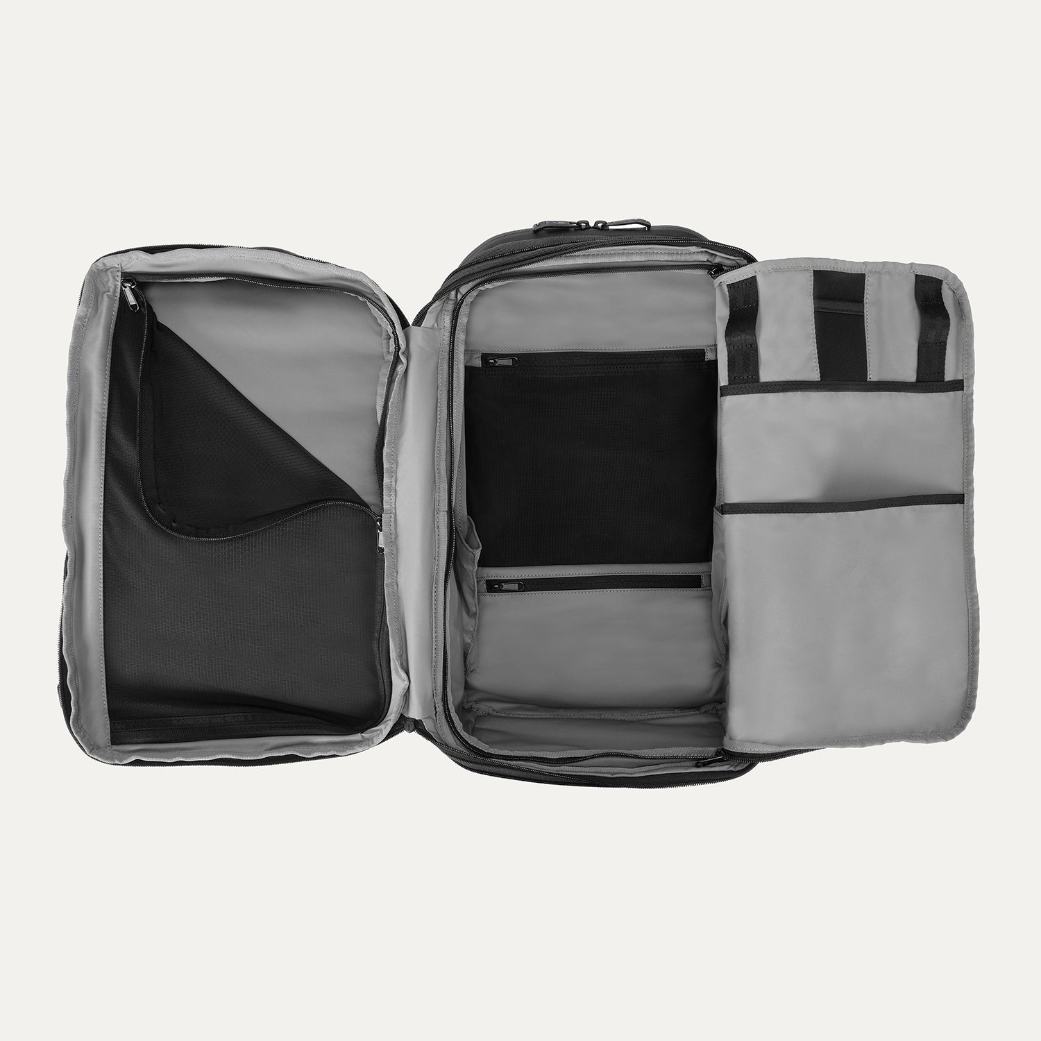 Interior view of Travelpross Altitude All-Purpose Laptop Backpack in Jet Black, featuring multiple compartments and zippered mesh pockets.
