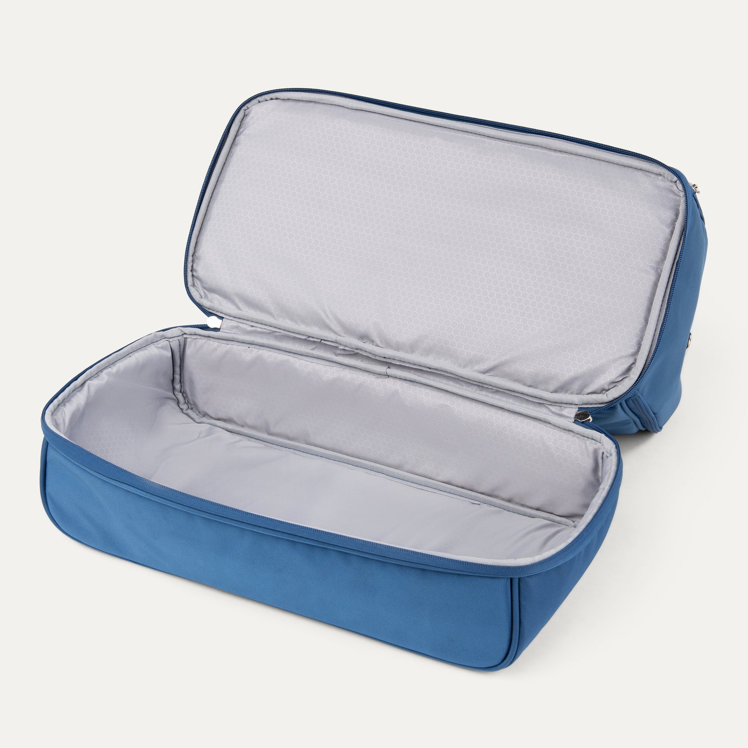 Blue weekender with open bottom on a white background