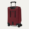 Red suitcase with wheels and handle on a white background
