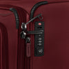 Close-up of a red suitcase with zipper and lock.