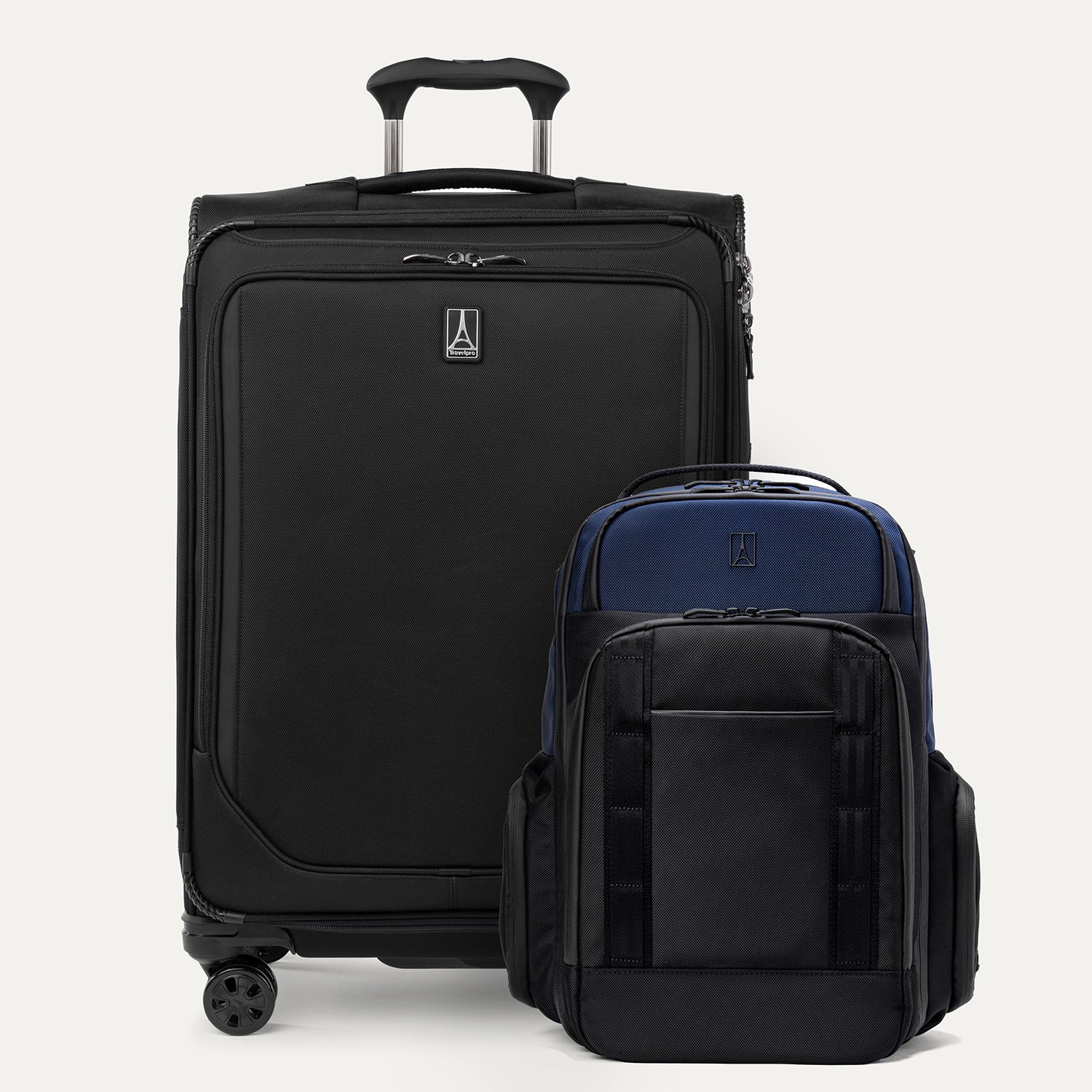 A set of two pieces of luggage, a large black spinner suitcase and a aviator navy backpack, both with the Travelpross brand logo.