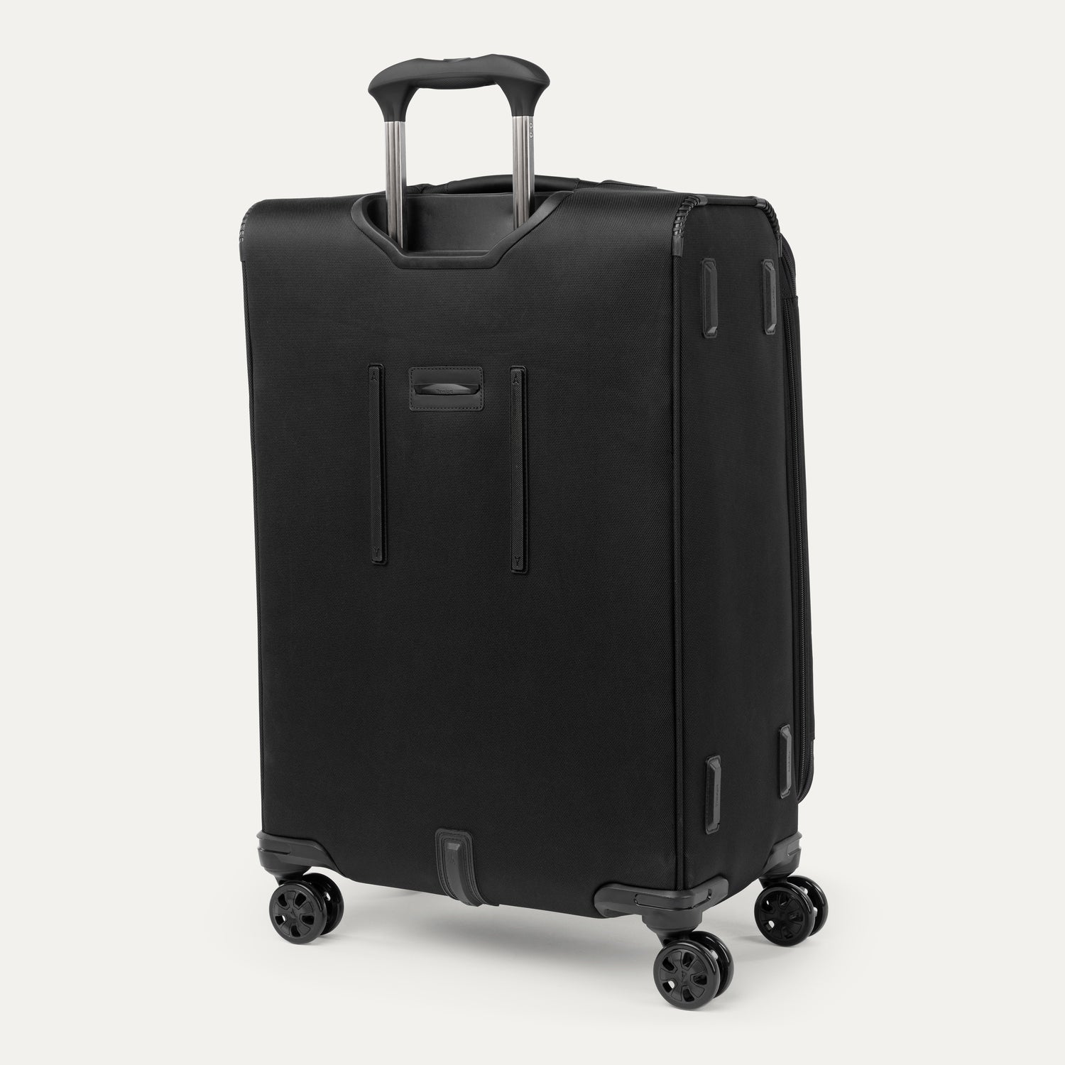 Black suitcase with wheels and handle on a white background