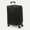 Black suitcase with wheels and handle on a white background