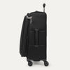 Side view of black suitcase with handle and wheels on a white a background 
