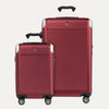 A set of two red hardside spinner suitcases, one carry-on and one check-in size, with the Travelpross logo visible