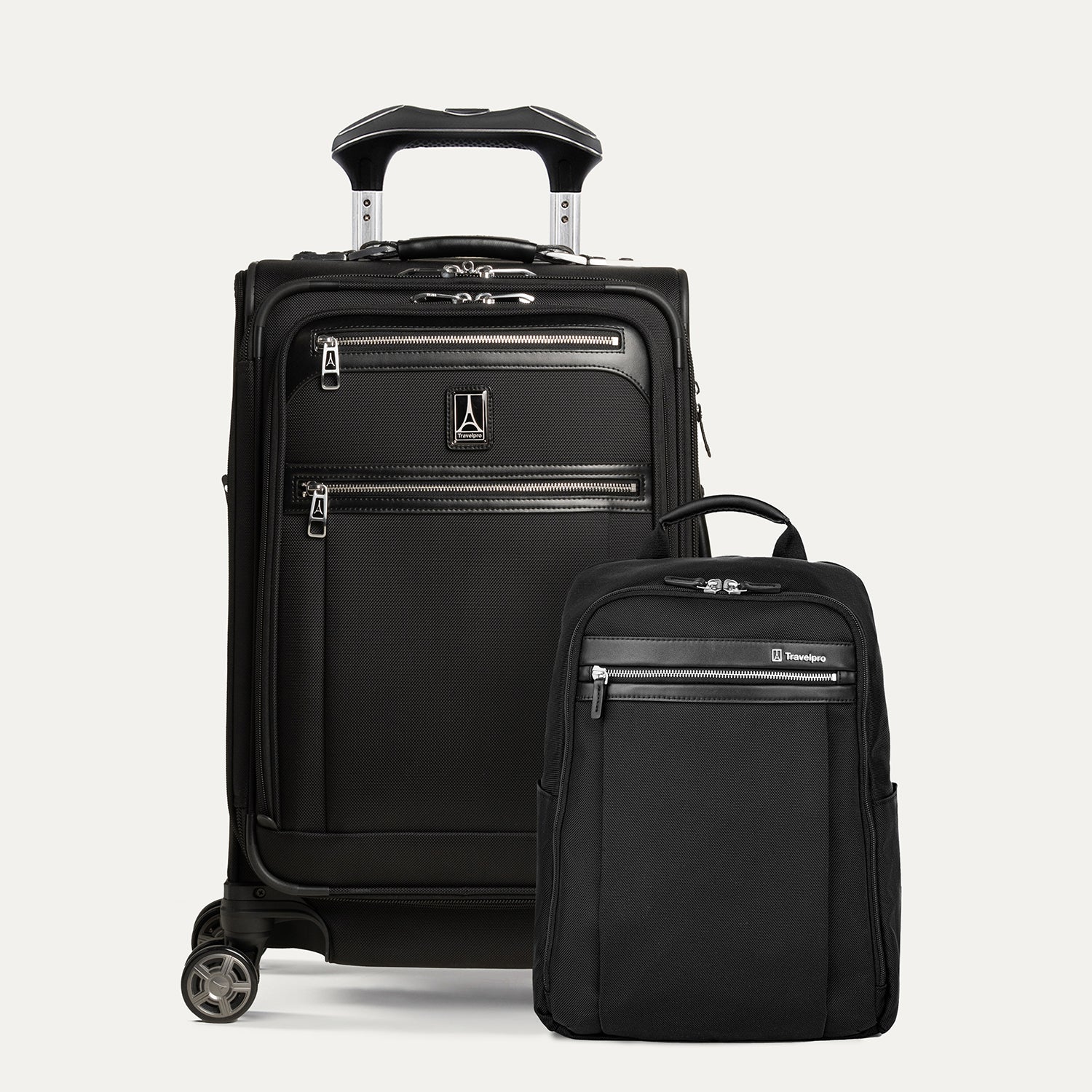 A set of black travel luggage, featuring a carry-on spinner suitcase and a slim backpack, both with the Travelpross brand logo.