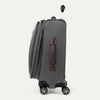 Gray suitcase with wheels and a brown handle on a white background