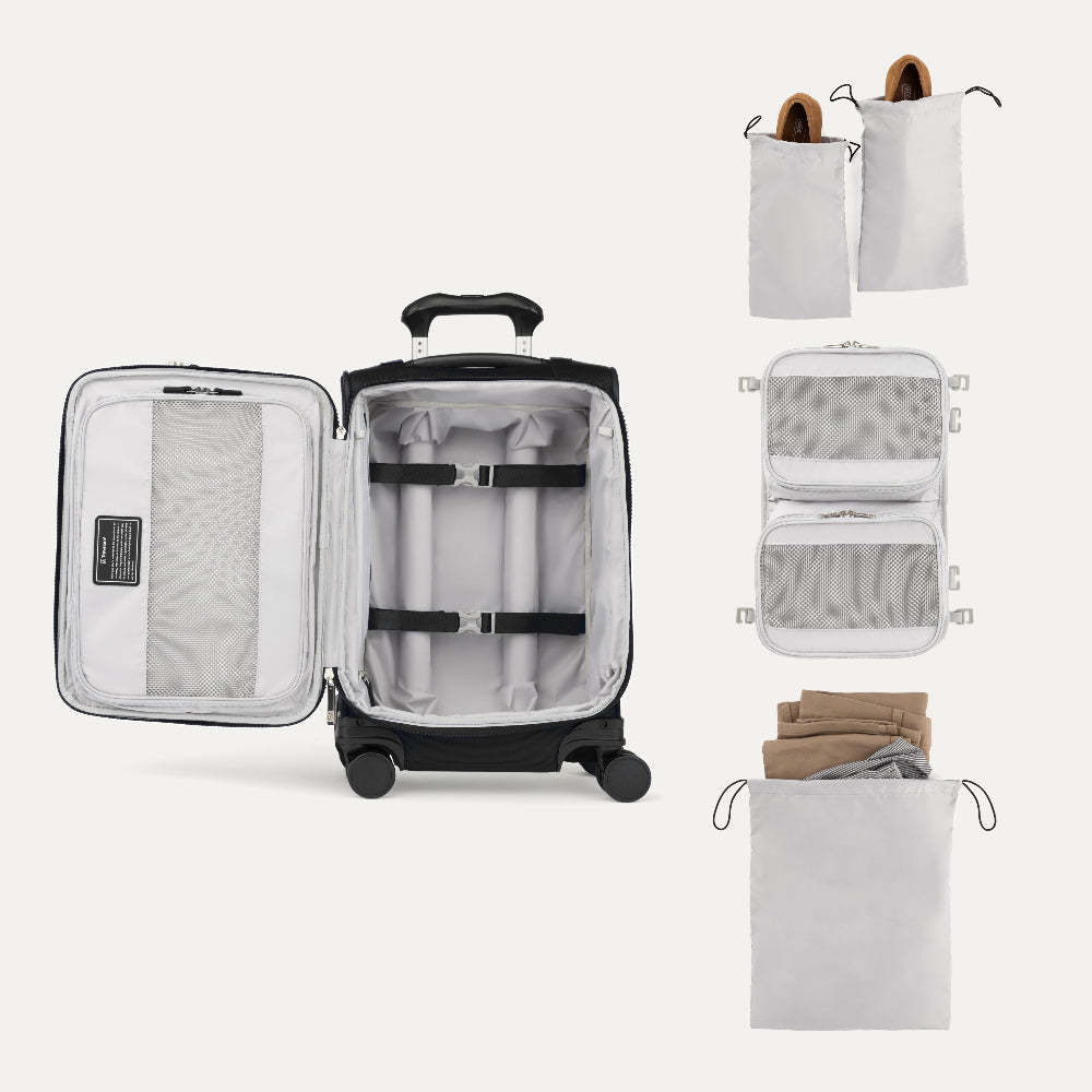 interior of black carry on suitcase with packing organizer and shoe bags