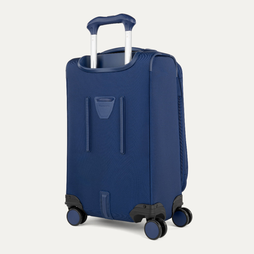 Blue suitcase with wheels on a white background
