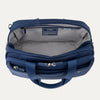 Blue tote bag with open lid on a light gray background