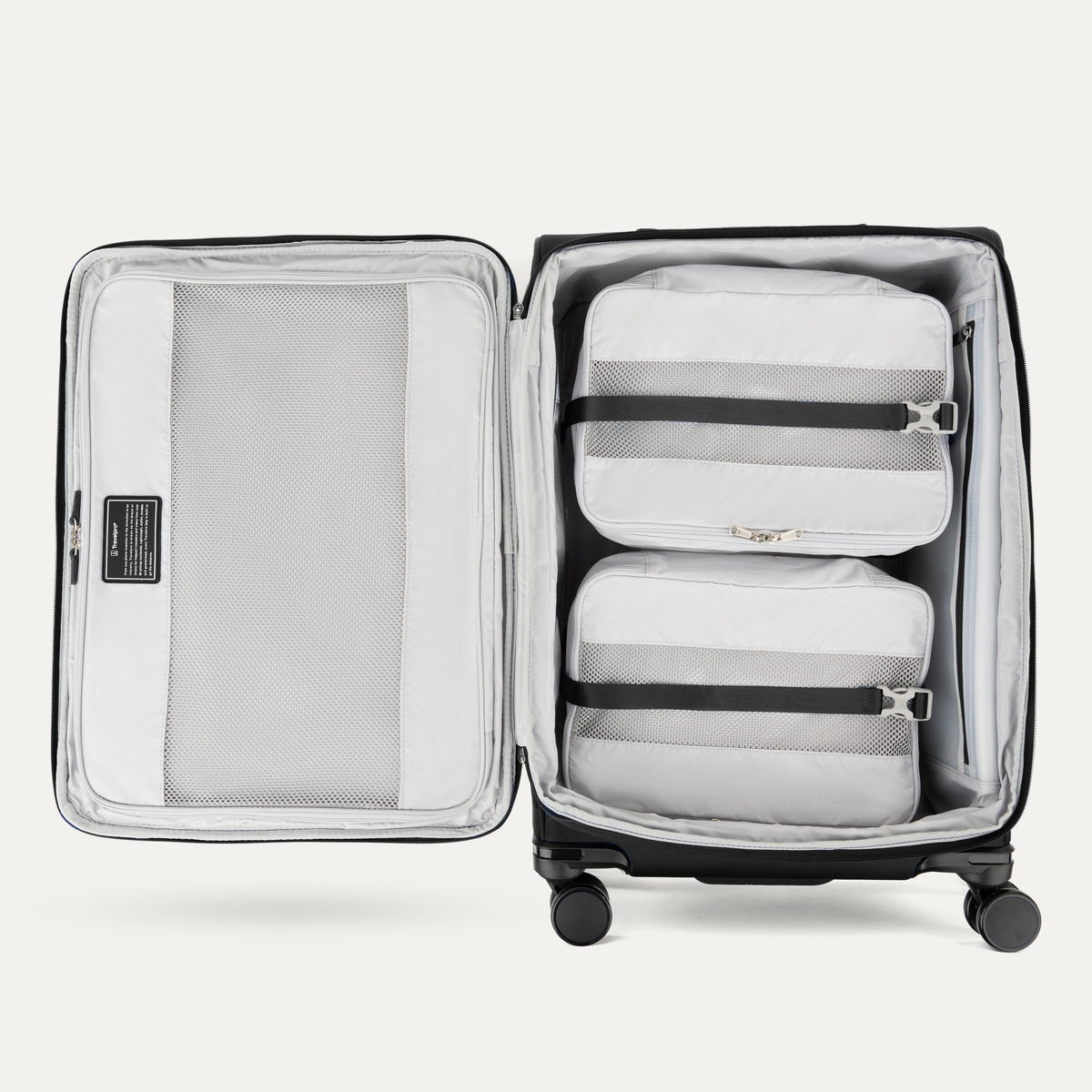 Open spinner suitcases in black , showing the interior compartments on a white background